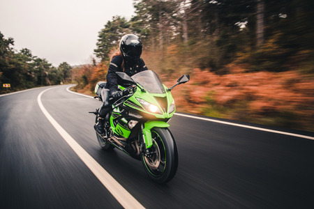 driving green neon color motorcycle road 1